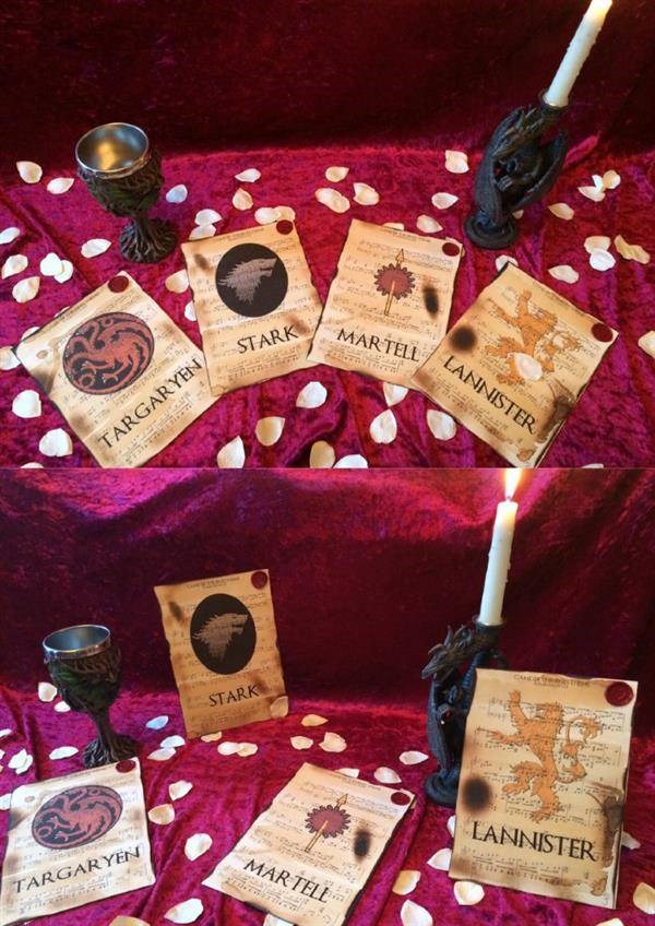 Game Of Thrones wedding table placement cards scattered on tables