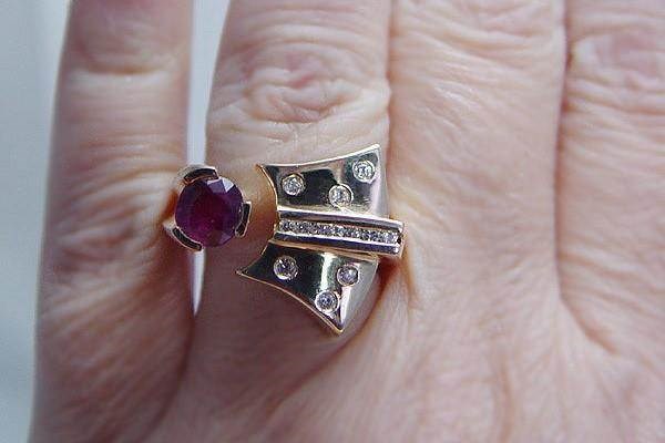 Unusual yellow gold, ruby and diamond ring by Estate Jewelry