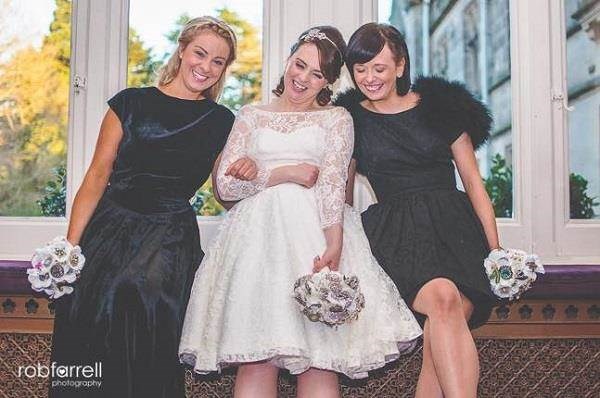 Very happy looking bride and bridesmaids