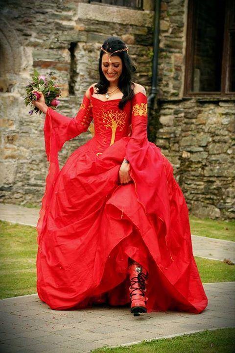 Red wedding dress by Uptight Clothing with New Rock boots