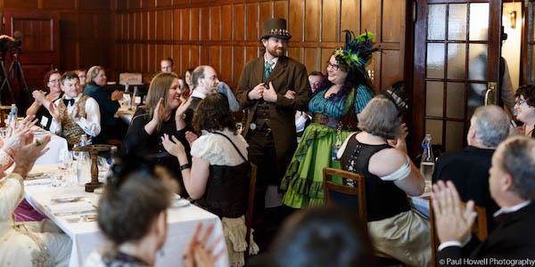 Steampunk bride and groom at wedding reception