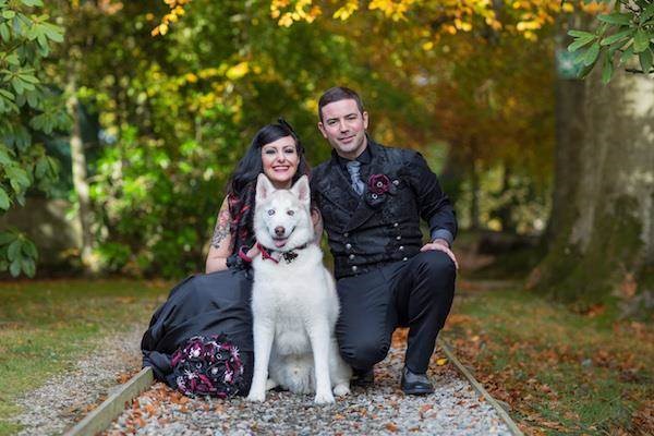 Halloween wedding couple with their Husky