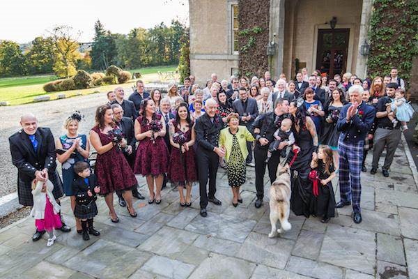 Wedding guests outside the venue at a Halloween Wedding