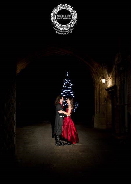 Night time shot of Gothic couple getting married at Thornbury Castle.