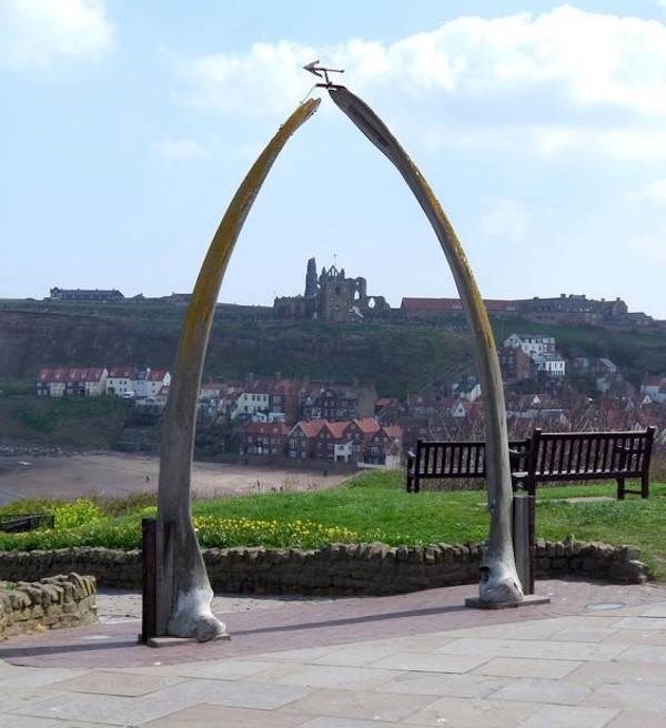 Whitby whale bones with Abbey in background