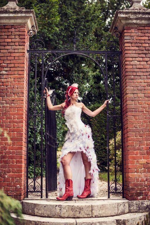 Bride Davina in her feather wedding dress.