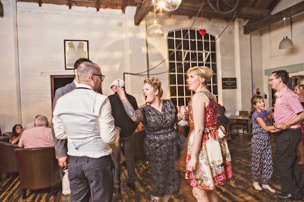 Flipping the bird at the wedding reception, photo by Lorna Lovecraft | Misfit Wedding