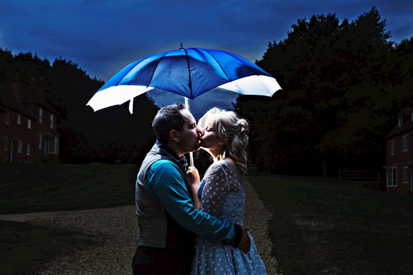 Bride and groom kissing, photo by Lorna Lovecraft | Misfit Wedding