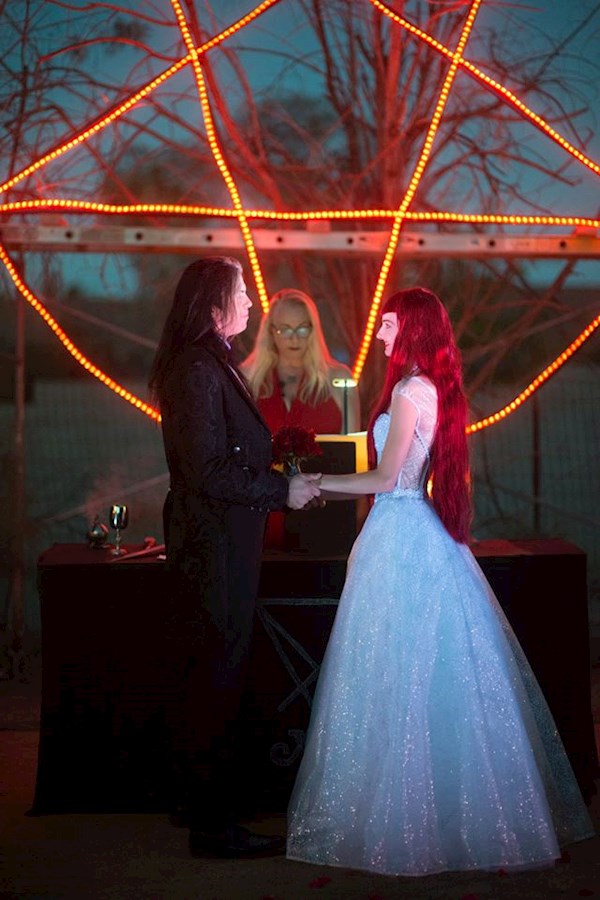 Satanist couple reciting their wedding vows | Misfit Wedding