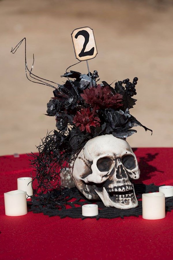 Skull centre pieces at a Satanic wedding | Misfit Wedding